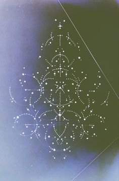 an image of a christmas tree with white dots on it