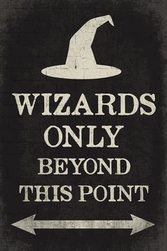 a sign that says wizards only beyond this point with an arrow pointing to the right