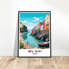 a poster with boats on the water in front of a white wall and wooden floor