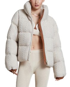 Nicole Benisti Kensington Cable Knit Puffer Jacket Knitted Puffer Jacket, Knit Puffer Jacket, Fitted Beige Cardigan For Cold Weather, Beige Wool Knitted Outerwear, Cozy Chunky Knit Fitted Sweater Coat, Beige Sweater Coat For Cold Winter Weather, Cable Knit Winter Outerwear, Cozy Knit Outerwear With Ribbed Cuffs, Cable Knit Outerwear For Cold Weather