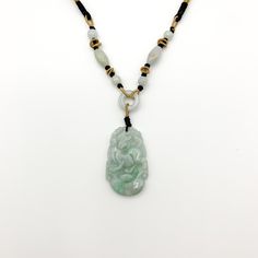 This is a high grade jadeite jade pendant necklace. It is exquisitely hand carved, so each pendant is different in some way. The pendant is completely natural jade, un-dyed and in its natural form. The pendant is carved in the form of the Chinese Zodiac - Dog. The beads above the pendant on the necklace are natural hand carved jadeite jade beads. They may not be perfectly round because they are hand carved. This gives the necklace a more rustic and natural stone like look. The years of the Dog i Dog Chinese Zodiac, Red Pendant Necklace, Red Pendant, Jade Pendant Necklace, Red Pendants, Natural Form, Jade Carving, Chinese Zodiac, Natural Jade