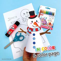 someone is making a paper snowman with crayons