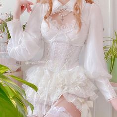 Dandelion Angelcore Lolita Corset with boned support, laced up front, ruffles. Tutu skirt is also available for purchase. Rose pin is not included. Size S Bust 75-95cm Waist 63-66cm Length 38cm Size M Bust 80-100cm Waist 66-70cm Length 39cm Size L Bust 85-100cm Waist 70-74cm Length 40cm Feminine Lace Corset Dress With Ruffles, Feminine Ruffled Corset, Feminine Overbust Corset With Ruffles, White Long Sleeve Corset For Spring, Coquette Ruffled Corset Dress For Costume Party, Coquette White Lace Corset, Spring Gothic Corset Dress With Ruffles, White Lace Coquette Corset, Fitted Balletcore Corset Dress With Ruffles