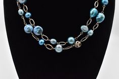 For your consideration, we are offering an elegant beaded necklace featuring sterling silver and blue pearl beads. weight: 43.47 grams Length: 35 1/2 inches Width: about 1/2 inch Hallmarks: 925 ** Due to USPS changes, standard shipping may take a few extra days.  If you would like a faster delivery time, we have added a new express shipping option.** Please feel free to reach out with any questions you might have about this item. **Please Note ~ The props used for photos will not be included.** We test all our vintage jewelry for karat content as well as gem testing when applicable. We use the Niton DXL Precious Metal Analyzer for metal purity, and for gem testing, we use the Presidium gem tester.  Furthermore, we tend to leave most jewelry as we receive it, as we do not want to risk damag