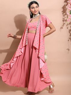 This ethnic co-ord set consists of a top, palazzos, and a jacket Pink & green floral printed cropped-top, has shoulder straps, sleeveless and slip-on closure Pink solid palazzos has a slip-on closure Comes with a matching printed jacket with short regular sleeves Size & Fit Please check the last image above for a complete size chart. Material & Care Top: Polyester Palazzos: Polyester Jacket: Polyester Machine Wash Summer Festive Palazzo Set With Cape Sleeves, Traditional Summer Sets With Cape Sleeves, Bohemian Party Sets For Spring, Bollywood Style Floral Print Choli For Summer, Summer Party Palazzo Set With Cape Sleeves, Bohemian Style Two-piece Party Set, Bohemian Two-piece Set For Party, Bohemian Fitted Sets With Cape Sleeves, Bohemian Floral Print Lehenga For Summer