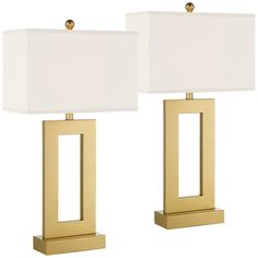 pair of brass table lamps with white shades