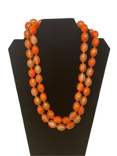 Vintage Retro 70s 80s Orange Gold Swirl Double Strand Beaded Necklace Floral Finial style Flower Neck Clasp Cute Vtg Costume Jewelry Good vintage condition. Measurements shown in photos. Display measurements also shown for size reference. Very lovely set of vintage costume jewelry with double strand beaded necklace. Orange and gold swirl beads with flower blossom  style clasp and long beads. Beautiful set. Feel free to message with any questions.  NOTE: Please keep in mind that, when you purchase vintage , it might not be perfect, but it will be authentic. No returns will be accepted on vintage items so make sure that you read the description and look at the pictures before committing to a. Please contact me if you have additional questions about the nature and condition of the product 70s Accessories Jewelry Vintage, 70 Jewelry Style, 1970s Jewelry Vintage 70s Necklaces, 70s Beaded Necklace, 70s Jewellery, 70's Jewelry, 70s Accessories Jewelry, 70s Jewelry Accessories, 70s Necklace