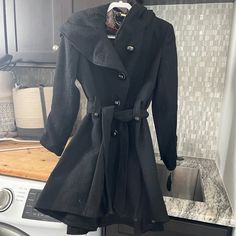 Beautiful Women’s Dress Coat With Hood. It Is A Little Longer In Back And Very Cute Style- Hugs The Figure! Size Large, New With Tags. Knee-length Black Outerwear For Work, Black Knee-length Outerwear For Work, Chic Black A-line Outerwear, Black A-line Outerwear For Work, Black Knee-length Outerwear For Office, Elegant Black Knee-length Outerwear, Elegant Knee-length Black Outerwear, Black A-line Outerwear For Spring, Formal Knee-length Winter Outerwear