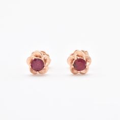 Certified Real Ruby Studs set with Ruby, size 3 millimeters diameter each, 0.3 Carats a pair.Solid 14k Rose Gold ☞ made to last.Click here for ☞ Solid Gold CollectionRuby Details:• CERTIFIED Natural Ruby • Weight: 0.3 Carats a pair• Dimensions: 3mm each• Color: Red• Cut: Round• Origin: BurmaSolid Yellow Gold Details:• 14k Solid Rose Gold• Dimensions: Length ≈ 5.6mm, Width ≈ 5.6mm• Lasts a lifetime - Perfect for everyday use (won’t tarnish)! *Final weight & dimensions depending on the chosen earr Gold Earrings With Prong Setting In 14k Rose Gold, Classic 14k Rose Gold Round Earrings, 14k Gold Flower Shaped Earrings For Anniversary, Fine Jewelry 14k Gold Round Flower Earrings, 14k Rose Gold Jewelry With Matching Earrings, Rose Gold Flower Shaped Earrings With Prong Setting, Rose Gold Flower-shaped Earrings With Prong Setting, Rose Gold 14k Flower Earrings For Anniversary, Elegant Rose Gold Earrings Stamped 14k