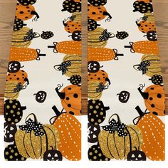 a pair of pumpkins and ladybugs on white socks with black polka dots