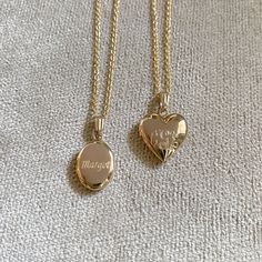 A child's plain polished 14K yellow gold-filled oval locket on a cable chain necklace with a lobster clasp. The outer shell is solid gold pressure-bonded to an inner core of high-quality brass. Locket Dimensions: 10 mm W x 20 mm H Chain Length: 15" Oval Locket Necklace, Oval Locket, Heart Locket Necklace, Cable Chain Necklace, Inner Core, Heart Locket, Locket Necklace, Cable Chain, Chain Lengths