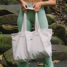 Stay stylish and organized with this gorgeous canvas tote bag from SALT ACTIVE! It's big enough to fit all your must-haves for the gym, a weekend getaway, or a carry-on. With its sleek SALT ACTIVE logo in sage green, you can show off your good taste while keeping everything you need in one place. Ready to make a statement? DETAILS Canvas Tote SALT ACTIVE LOGO In sage green 48cm x 35cm x 12cm Sporty Canvas Bag For Weekend, Sporty Canvas Tote Bag, Casual Tote Gym Bag For Weekend, Sporty Canvas Tote Bag For Everyday Use, Sporty Large Capacity Canvas Tote Bag, Sporty Everyday Canvas Tote Bag, Sporty Everyday Tote Canvas Bag, Large Capacity Tote Gym Bag For Weekend, Sporty Tote Gym Bag For Weekend