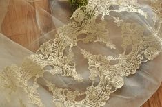 Vintage style lace fabric trim in soft ivory color . Width: about 22 cm/ 8.6'' , I am selling this in one yard , more yardages will be cut into one piece . This stunning design piece has very soft hand feel, ideal for clothing, party dress, lingeries, dolls outfits, curtains, shams, lamp shades, * Ideal for ivory lace trim, ivory lace dress, ivory bridal garter, ivory flower girl dress, lace dress, bridal dress and wedding gown .https://www.etsy.com/shop/beautyfabric Jewelry Headband, Gold Lace Fabric, Corded Lace Fabric, Ivory Flower Girl, Ivory Lace Dress, Ivory Flower Girl Dresses, Wedding Veils Lace, Grace And Lace, Lace Veil