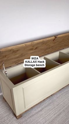 the storage bench is made out of wood and has four compartments for storing items in it