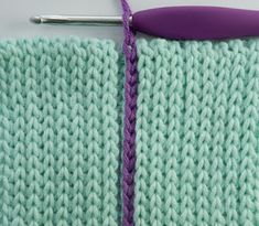 the crochet stitch is being worked on