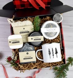 Now, this gift is truly merry and bright! Spoil the man in your life this holiday season with this luxury collection of gifts. This gift box has all the right products to make him feel special and it's all-natural! It comes with a variety of artisanal and natural spa items to keep things cheery all winter long Complete with a sturdy enamel mug, a tin of loose leaf tea + strainer, artisan soap bar, shower steamer, body butter in a plaid gift box. Great way to say, happy holidays! WHAT'S INCLUDED Gift Box For Him, Natural Showers, Lavender Body Butter, Spa Items, Sandalwood Scent, Merry Christmas Gift, Holiday Gift Box, Soap Saver, Merry Christmas Gifts