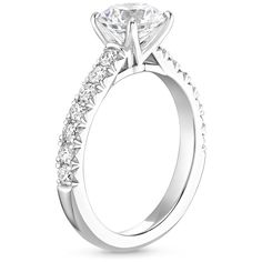 a white gold engagement ring with side stones