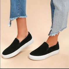 New In Box Black Flat Heel Slip-ons For Everyday, Casual Black Slip-ons With Contrast Sole, Black High-top Slip-on Sneakers For Spring, Black Suede Slip-ons With Round Toe, Black Suede Flat Slip-ons, Trendy Black Slip-on Sneakers With Rubber Sole, Trendy Black Leather Slip-ons, Black Low-top Slip-ons For Spring, Black Slip-on Sneakers With Flat Heel