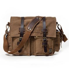 This men's laptop messenger bag is of retro minimalist design, with thick shoulder strap handle, more comfortable; 
This canvas shoulder bag will meet all your requirements, and it looks absolutely perfect. You will like it. 
     The Classic Messenger Bag Canvas is a stylish and versatile bag that is perfect for everyday use. It is made of high-quality cotton canvas material that is durable and comfortable to wear. The bag's classic and minimalist design makes it a great choice for both men and women. It comes with an adjustable shoulder strap that can be easily adjusted for a comfortable fit. The bag's flap closure keeps your items secure and protected from the elements. This messenger bag is perfect for students, professionals, and anyone who wants a stylish and practical bag for da Retro Brown Canvas Bag With Large Capacity, Brown Canvas Briefcase For Everyday Use, Brown Shoulder Canvas Bag For Business, Brown Canvas Laptop Bag For Outdoor, Casual Brown Waxed Canvas Laptop Bag, Brown Canvas Laptop Bag With Canvas Lining, Brown Satchel Laptop Bag With Canvas Lining, Brown Rectangular Laptop Bag With Canvas Lining, Brown Shoulder Laptop Bag For Outdoor