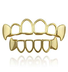 PRICES MAY VARY. Made from fine brass metal and plated with 14K gold which doesn’t easily fade. High quality brass is used as base metal to keep our grillz durable and not easy to broke. One size fit most: It will fit 99% of the people with our adjustable silicon molding bars. EVEN if you have chipped or crooked teeth! This means that it fits any mouth size regardless of the shape of your mouth. Teeth grillz can be used on any Occasional such as Party, Rave Parties, Discos, Clubs, Halloween, Bir Gold Punk Jewelry For Halloween, Punk Gold Jewelry For Halloween, Punk Style Gold Jewelry For Halloween, Fangs Grillz, Gold Fangs, Gold Teeth Grillz, Teeth Vampire, Rapper Costume, Fang Grillz