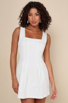 Show off your angelic aesthetic in the Lulus Pure Hearted White Pearl Square Neck Sleeveless Mini Dress! Slightly stretchy twill shapes this sweet dress with wide straps and a trendy square neckline, all trimmed with gleaming faux pearls. The fitted, seamed bodice continues into a slightly pleated A-line skirt that ends at a mini hem. Hidden back zipper/clasp. Fit: This garment fits true to size. Length: Mid-thigh. Size medium measures 32.5" from shoulder to hem. Bust: Great for any cup size. Wa White Dress With Pearls, Angelic Aesthetic, Nye Dress, Blue Skater Dress, Vacation Mood, Eve Dresses, New Years Eve Dresses, Lulu Fashion, New Years Dress