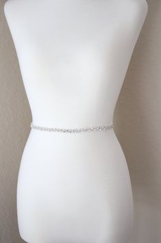 BRITTANY Crystal Bridal Belt DETAILS: Sparkling Austrian Crystals Long Organza Ribbons - Available in Bridal White or Ivory Embellished Area Length: 20.5 Inches (52.07 CM) Embellished Area Width: 0.5 Inches (1.27 CM) Ribbon Length: 58 Inches (147 CM) Ribbon Ties at the ends for universal fit Belt Total Length: 78.5 Inches (199 CM) Comes in a Beautiful EDEN LUXE Bridal Signature Beribboned Keepsake Box. We are OBSESSED with pretty packaging! SHIPPING TIMEFRAME: WORLDWIDE SHIPPING Made to Order- a White Crystal Bridal Belt For Party, Elegant White Bridal Belt With Ribbon, Elegant White Satin Bridal Belt, White Rhinestone Bridal Belt, White Embellished Lace Bridal Belt, Red Carpet Look, Gown Photos, Wedding Belts, Organza Ribbon