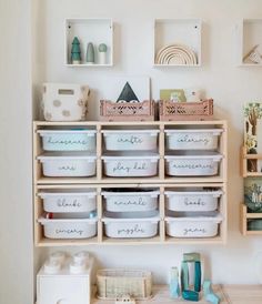 the shelves are filled with plastic containers and baskets