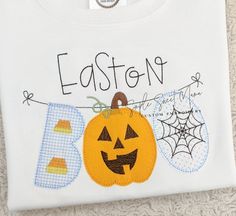 Halloween Banner Applique Please leave all info needed in Notes To Seller at Checkout Size Boy/Girl (girls fabrics will be pink) Name Font choice Any specific color changes If you would like a different color tee/bubble/romper than shown, please contact me before checkout Applique takes more time/materials/(and lots of patience) than embroidery. I receive lots of questions asking why it costs more than embroidery. This is why ❤️ Halloween Applique, Pink Names, Halloween Banner, S Monogram, Happy Heart, Boy Clothes, Boys Clothing