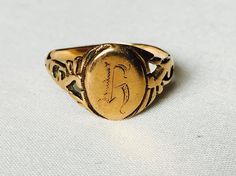 Vintage 14k Rose Gold Art Deco Style Designer Filigree Ring Featuring Old World Scribed Initial Face Victorian Signet Ring With Intricate Design, Victorian Style Signet Ring With Intricate Design, Victorian Gold Engraved Ring, Victorian Style Gold Engraved Ring, Vintage Ceremonial Engraved Ring With Intricate Design, Vintage Gold Engraved Ring With Maker's Mark, Victorian Signet Ring For Wedding With Intricate Design, Victorian Gold Engraved Collectible Ring, Vintage Engraved Ring With Historical Design