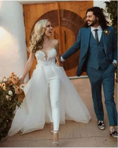 a bride and groom are walking together