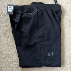 Brand New Joggers Black Sports Pants With Hip Pockets, Black Cargo Pants With Hip Pockets, Black Cargo Pants For Athleisure, Black Techwear Workout Bottoms, Under Armour Black Sweatpants With Pockets, Under Armour Black Sweatpants For Sports, Under Armour Black Workout Bottoms, Black Sweatpants With Hip Pockets For Sports, Under Armour Black Functional Bottoms