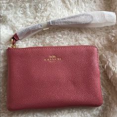 Coach Small Wristlet. Pink Color With Gold Zipper Silver Shimmer New! Never Used. Coach Clutch Pouch With Zipper Closure, Pink Wristlet With Removable Pouch, Pink Wristlet For Daily Use, Pink Wristlet With Wrist Strap For Daily Use, Chic Pink Wallet With Zipper Closure, Everyday Pink Clutch With Zipper Pouch, Pink Pouch Clutch With Wrist Strap, Pink Everyday Clutch With Zipper Closure, Pink Wristlet With Removable Pouch For Everyday Use