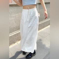 Long Straight Skirt With Two Back Pockets, Drawstring Waist And A Split At The Back. Fabrics: 70% Cotton, 30% Linen Measurements: 35" (88 Cm) Length, 28" (70 Cm) Waist (Stretches) Made In: China Nwot White Maxi Skirt With Pockets For Summer, Casual Summer Maxi Skirt For Daywear, White High-waist Maxi Skirt For Spring, White High Waist Maxi Skirt For Spring, Casual Cotton Maxi Skirt For Daywear, White Wide Leg Skirt For Vacation, White Long Maxi Skirt With Pockets, White Long Skirt With Pockets, Casual White Wide Leg Maxi Skirt