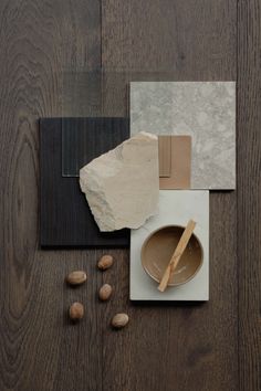 a wooden table topped with different types of materials