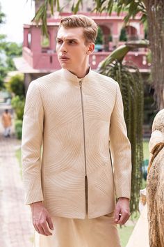 Beige full sleeves bandhgala with all over leather dori swerve embroidery. Paired with a kurta and a pant. - Aza Fashions Designer Fitted Beige Nehru Jacket, Designer Long Sleeve Beige Sherwani, Luxury Traditional Wear With Long Sleeves, Luxury Long Sleeve Traditional Wear, Designer Beige Bandhgala For Formal Occasions, Designer Nehru Jacket For Ceremonial Occasion, Formal Beige Long Sleeve Bandhgala, Formal Long Sleeve Beige Bandhgala, Beige Long-sleeved Nehru Jacket For Festivals