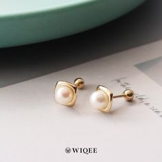 🍃--Details-- Handmade item Materials: Solid Gold (no gold filled or gold plated) Gold Kt: 10K Gemstone: Freshwater Pearl Gem colour:white Style: Minimalist & Modern & Classic Made to Order 🍃--Description-- ❤️All components of the Earrings are genuine 14ct Gold. ❤️10K Solid Gold Natural Freshwater Pearl Tiny Stud Earrings, 10K Real Gold Pearl ball end piercing, Cartilage Helix 2nd/3rd earlobe Piercings 🍃Ring Features  ✪ 10k Solid Gold  (no gold filled or gold plated) ✪ AAA Grade Natural Freshwater Pearl ✪ Pearl Size :4.7*4.7mm ✪ Earring size : 6.4*6.4mm ✪ Thickness: 0.8 mm ✪ Gold Colour : Yellow Gold ✪ Made to Order  --Others Information--  🔧Making:  WIQEE Jewels' pieces made to order. Please allow 4 - 8 business days for manufacturing. Need it sooner? Just ask and we will let you know Classic Hypoallergenic Piercings For Gift, Classic White Hypoallergenic Cartilage Earrings, Classic White Cartilage Earrings As Gift, Classic Cartilage Earrings, Single Earring As Gift, Classic Single Cartilage Earring As Gift, Classic Nickel-free Cartilage Earrings As Gift, Handmade Round Elegant Cartilage Earrings, Nickel Free Classic Cartilage Earrings As Gift, Elegant Nickel-free Piercings For Anniversary