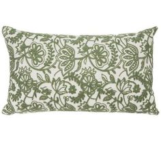 a green and white pillow on a white background