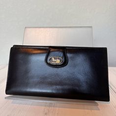 Celine Paris Vintage Card Holder In Black Patent Leather. Features The Iconic Celine Horse And Carriage Logo In Golden Hardware. Very Good Overall Condition With Minor Patent Leather Scratches. Width: 7.3 In Height: 3.9 In Timeless Evening Wallets, Rectangular, Timeless Evening Rectangular Wallet, Classic Rectangular Wallet With Gold-tone Hardware, Classic Rectangular Wallets With Gold-tone Hardware, Classic Clutch Wallet With Gold-tone Hardware, Classic Clutch Wallet With Snap Closure, Elegant Bifold Wallet With Gold-tone Hardware, Classic Formal Wallets With Gold-tone Hardware, Elegant Everyday Wallet With Snap Closure