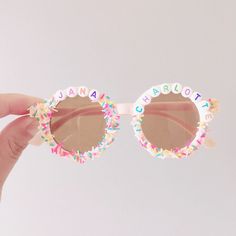 Multicolor Glass Sunglasses For Summer, Multicolor Tinted Sunglasses For Festivals, Multicolor Tinted Festival Sunglasses, Cute Sunglasses With Uva Protection For Vacation, Playful Sunglasses With Uva Protection For Vacation, Multicolor Plastic Sunglasses For Birthday, White Tinted Festival Sunglasses, Cute Sunglasses With Uv Protection For Vacation, Cute Sunglasses With Uva Protection For Spring