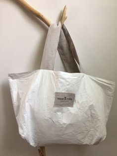 "Linen- Tyvek overside , double-sided tote bag, you can use it as shopper bag, summer beach bag or everyday bag. The bag has wide handles made out of washed linen too. The linen can be in color: natural, pink, light grey, grey, navy, black. Inside is always white Tyvek. Unique design only to buy in Tavana Studio. DETAILS: *made from 100% pre- washed linen and Tyvek *color: dark gray and white (The colors of the item may vary slightly due to different computer monitor settings) *double-sided * ma Tyvek Bags, Summer Beach Bag, Bag Styles, Linen Tote Bag, Bags Ideas, Bag Summer, Crafting Materials, Linen Bag, Linen Shop