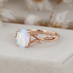 Experience the fusion of elegance and nature with our Rose Gold Women's Ring featuring an exquisite Oval Cut White Opal. It's a statement of your unique style. Nature-inspired White Jewelry For Wedding, Nature-inspired White Jewelry For Weddings, Nature-inspired White Wedding Jewelry, Split Engagement Ring, White Opal Ring, Women Rising, Opal Ring, White Opal, Ring For Women