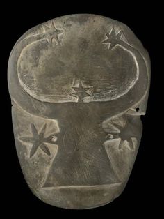 an old metal object with stars on it