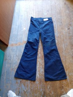 Men's vintage 687 Levi's big navy color Bell bottom jeans made in USA tell on 42 zipper high front rise button fron t 30x29 measures 15 in across the waist 29 inch inseam 12-in front rise 12 in across the bottom cuff 31x30 measures 15.5 across the waist 30 inch inseam 12-in front rise and 12 in across the bottom cup Bellbottom Jean, 1970s Men, Retro Disco, Leisure Suit, Bottom Jeans, Bell Bottom, Vintage Levis, Cotton Pants, Navy Color