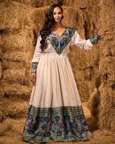 This elegant Habesha dress features a rich, dark blue hue with beautifully crafted patterns that capture the essence of tradition and modern style. The intricate detailing adds sophistication, making it perfect for special occasions or cultural celebrations. Holiday Wedding Dress, Habesha Dress, Habesha Kemis, Cultural Celebration, Wedding Dresses Simple, British Indian, Blue Hues, Blue Pattern, Ethiopia