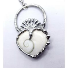 I Took An Amazing White Shell Heart Shaped Fossil Crafted Into A Beautiful Renaissance / Medieval Pendant, Hung From An 18" Long Matching Chain. This Isn't Your Typical Jewelry Piece, And It Will Definitely Be One Of A Kind. The Metal Work Is Hand Done By Me Using A Tin & Silver Bearing Low Melting Alloy That Has Been Hand Patinated And Sealed. This Comes On A Rolo Stainless Steel A 18in Chain Will Be Attached, As Pictured. Can Request Any Length Up To 30". Thanks! Handmade Jewelry, Healing, Reiki, Wicken, Wicca, Healing Crystals, Men's Fashion, Women's Fashion, Unisex Jewelry, Handmade Jewelry, Renaissance, Gothic, Rocker, Bohemian, Boho Style, Dark, Solder, Tiffany Style, Metal Work, Si White Heart Cut Necklace For Valentine's Day, White Heart Necklace For Valentine's Day, Unique White Necklace For Anniversary, White Heart Beads Necklace For Valentine's Day, White Open Heart Jewelry With Heart Beads, White Open Heart Jewelry For Gift, White Heart Cut Necklace For Wedding, White Heart Pendant Necklace With Heart Charm, White Jewelry With Heart Beads