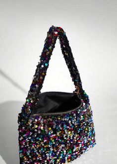 Indulge in the luxurious elegance of our Contrast Sequin Evening Bag. Featuring an eye-catching multicolor design, this bag is perfect for adding a touch of sparkle to any evening ensemble. The zipper closure ensures your belongings stay safe and secure, while the mini size makes it the perfect accessory for a night out. Elevate your style with this sophisticated and exclusive bag. Exclusive Bag, Stay Safe, Be Perfect, Evening Bags, Night Out, Sequin, Sparkle, Zipper, Design