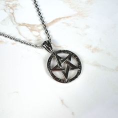 With this stainless steel pentacle necklace, wearing your jewelry will be part of your daily magical ritual! Made of stainless steel, it is a high-quality and durable necklace you'll wear every day.  The pentacle symbolizes the five elements united (air, water, earth, fire, and ether). It's the perfect witchcraft jewelry to feel connected to your path. Why should you adopt it? the style of the thick chain the durability of stainless steel, to feel even more connected to your magickal path, the u Adjustable Gothic Stainless Steel Necklace, Nickel Free Gothic Stainless Steel Necklaces, Gothic Stainless Steel Nickel-free Necklaces, Gothic Stainless Steel Nickel-free Necklace, Gothic Engraved Stainless Steel Jewelry, Gothic Stainless Steel Engraved Jewelry, Witchcraft Jewelry, Witchcraft Symbols, Pentacle Necklace