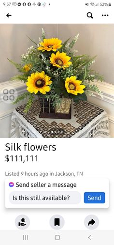 a vase filled with yellow flowers sitting on top of a table