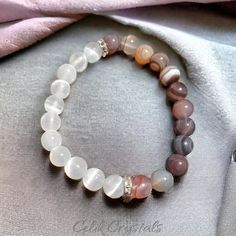 Standard Size Is 7.5 Inches. Message Me If You Would Like Any Size Between 6.5 - 8.5 Inches. -Introducing The Botswana Agate, Selenite Bracelet - A Mesmerizing Piece Of Jewelry Designed To Enhance Your Spiritual Well-Being. Crafted From Natural Stones With 8mm Stretch Beads, This Bracelet Is Not Only A Stunning Fashion Accessory But Is Also Believed To Have Spiritual Healing Properties. -The Bracelet Features Botswana Agate And Selenite Stones That Are Known By Many For Their Ability To Promote White Agate Spiritual Stretch Bracelet, White Agate Bracelets With 8mm Beads, White Agate Gemstone Bracelets, Selenite Bracelet, Bracelet Stones, Selenite Stone, Stunning Fashion, Bracelets Design, Botswana Agate