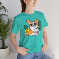 Introducing our Summer Corgi Unisex Graphic Tee – a must-have addition to your warm-weather wardrobe that combines adorable corgi charm with the laid-back vibes of summer! This tee isn't just clothing; it's a fun and stylish way to celebrate your love for these delightful pups and the sunny season. Crafted for both men and women who adore corgis, this tee is perfect for adding a touch of whimsy to your summer look, whether you're lounging at the beach or soaking up the sun by the pool. Featuring a playful corgi graphic and made from high-quality materials for comfort and durability, this tee is sure to become a favorite in your collection. Whether you're a proud corgi lover or searching for the perfect gift for a fellow dog enthusiast, our Summer Corgi Unisex Graphic Tee is guaranteed to b Corgi Graphic, Corgi Shirt, Beach Dog, Sunny Season, Apparel Merchandising, Dog Beach, Dog T Shirt, Summer Break, Dog Tshirt